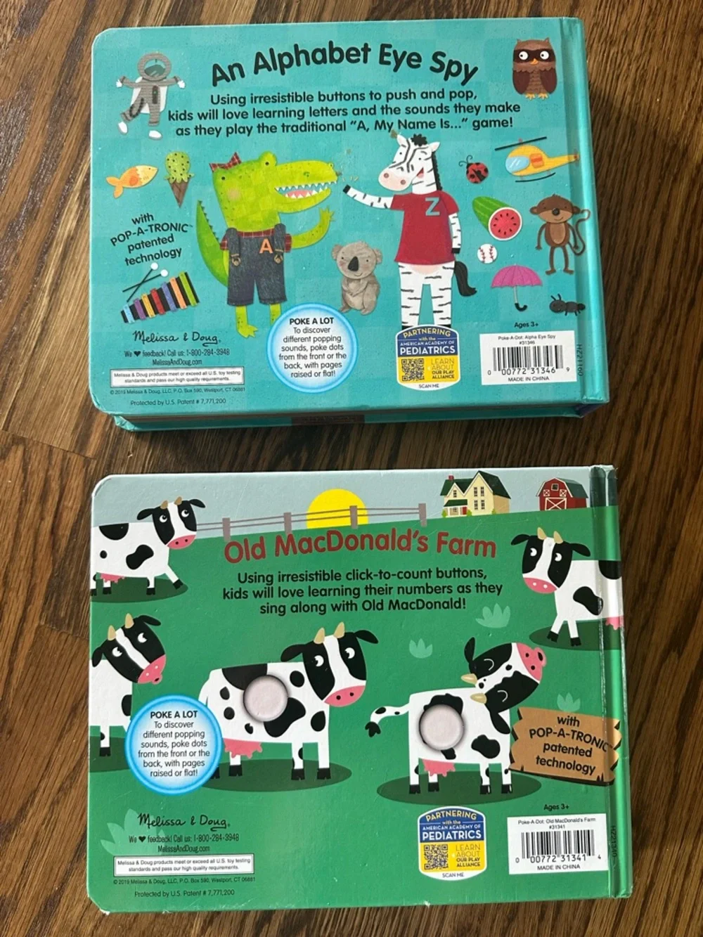 Melissa & Doug Poke-a-Dot interactive books (set of 2)